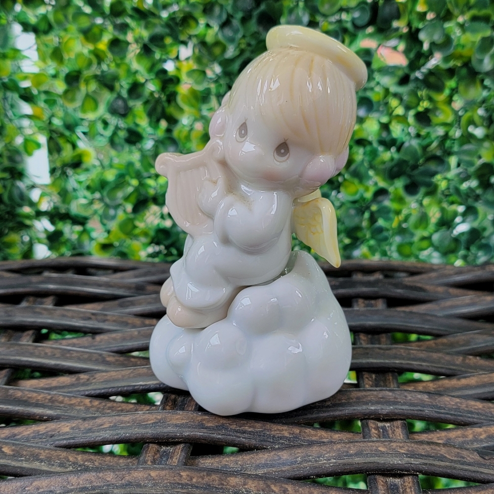 Ceramic Angel Figurine with Yellow Wings